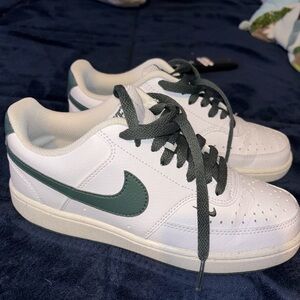 Green Nike sneakers 6.5